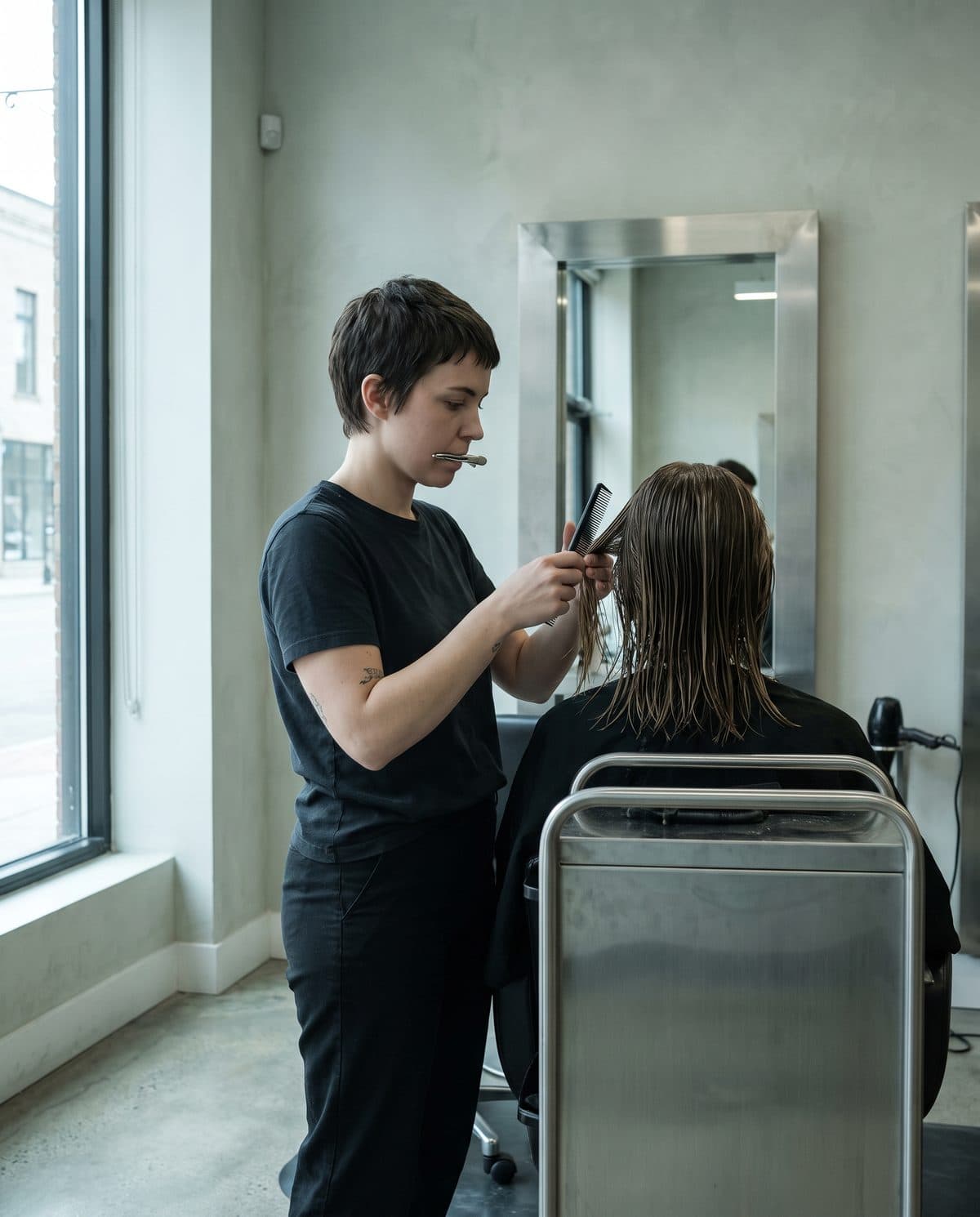 Wren Ostberg at her chair at Mica Hair Studio